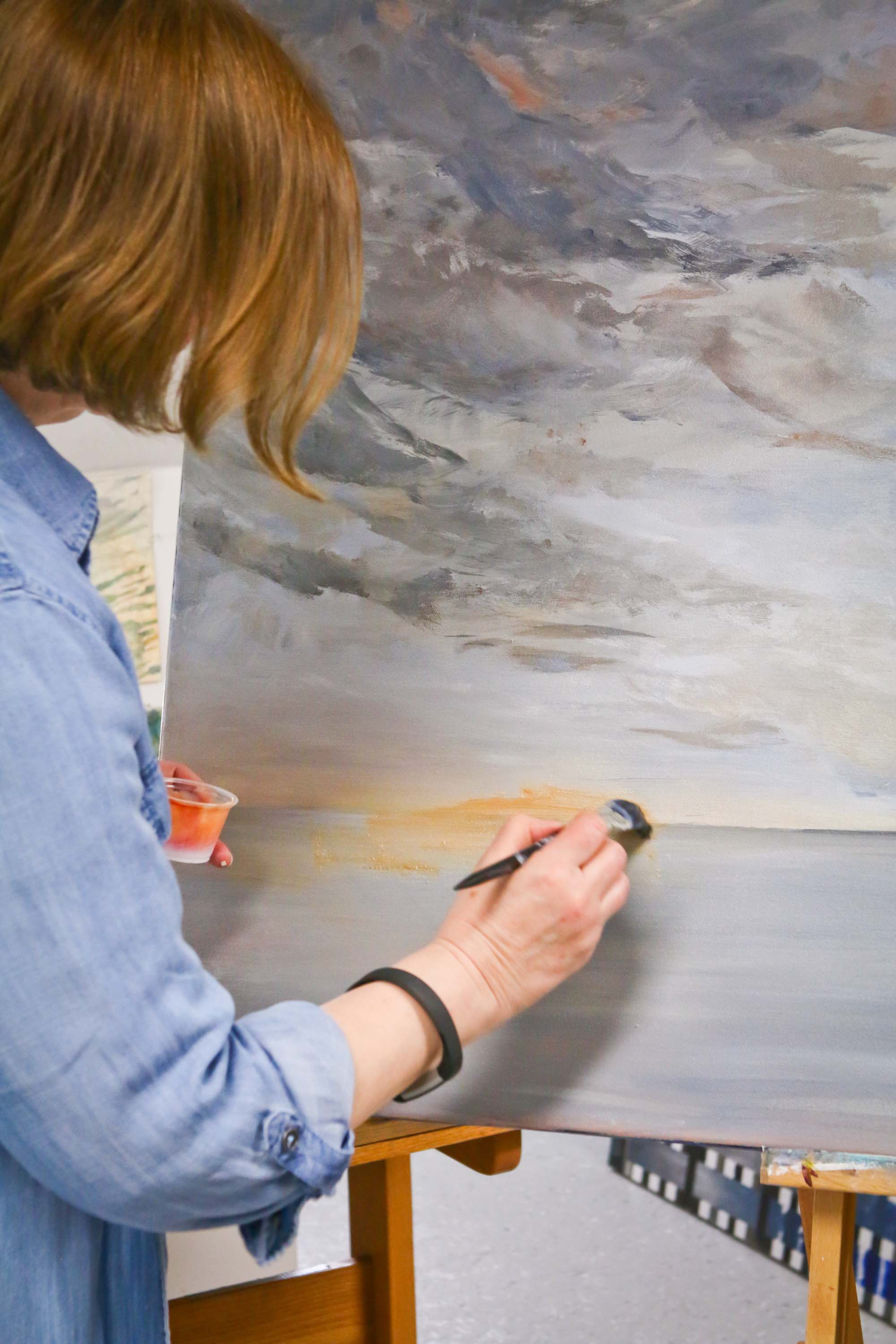 at the easel
